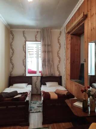 Гостевой дом Guest House Pangani Местиа Четырехместный номер-11